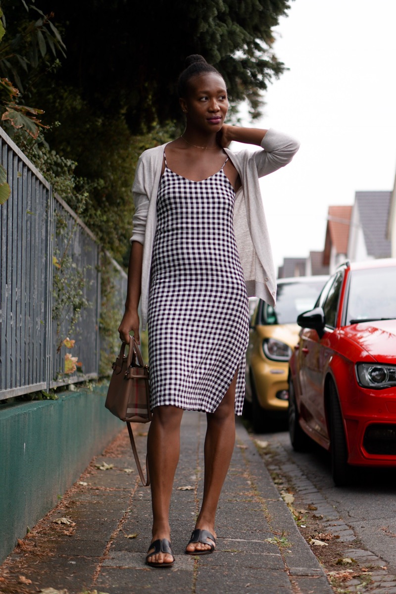 Jey in checkered midi dress